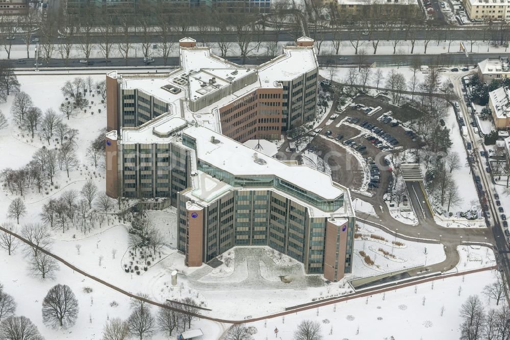 Dortmund from the bird's eye view: Winter - Aerial view of snow-covered building the Signal-Iduna headquarters, an insurance company in Dortmund in North Rhine-Westphalia