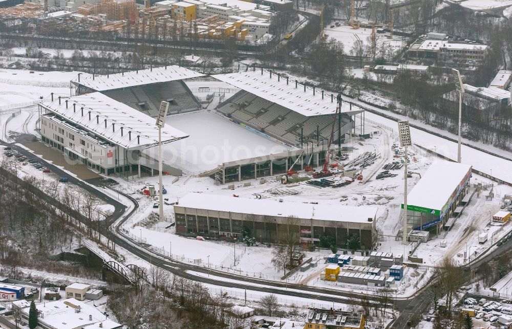 Aerial image Essen - View at the new construction of a soccer stadium in the Hafenstraße in Essen in the federal state North Rhine-Westphalia. The new stadium becomes the home ground of Rot- Weis Essen and will also be used as an event and concert area. The for the construction responsible GVE Grundstücksverwaltung Stadt Essen GmbH has commissioned the Köster GmbH with the operation