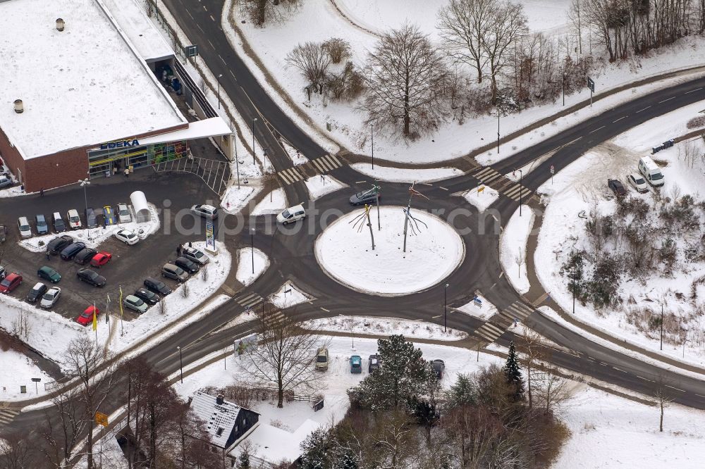 Aerial image Arnsberg - Winter Cityscape roundabout Hellfelder street in Arnsberg in the Sauerland in North Rhine-Westphalia NRW