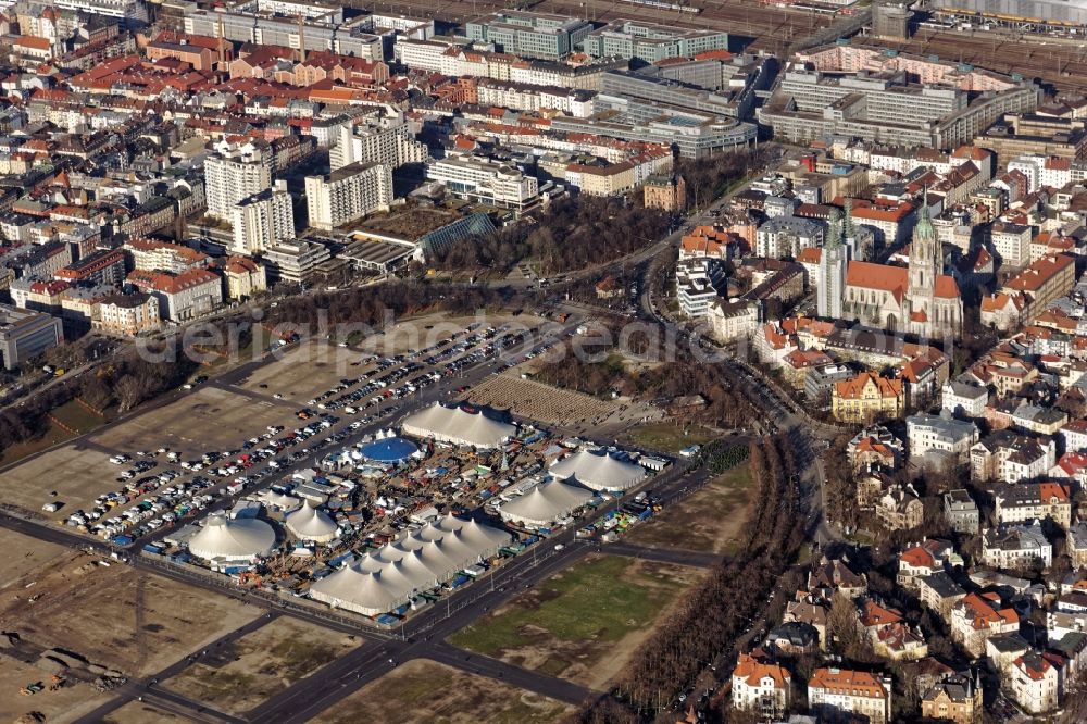 München from the bird's eye view: Winter Tollwood Festival with Christmas market at the Theresienwiese in Munich in Bavaria. The cultural events include theater, marketplace of ideas, world Salon