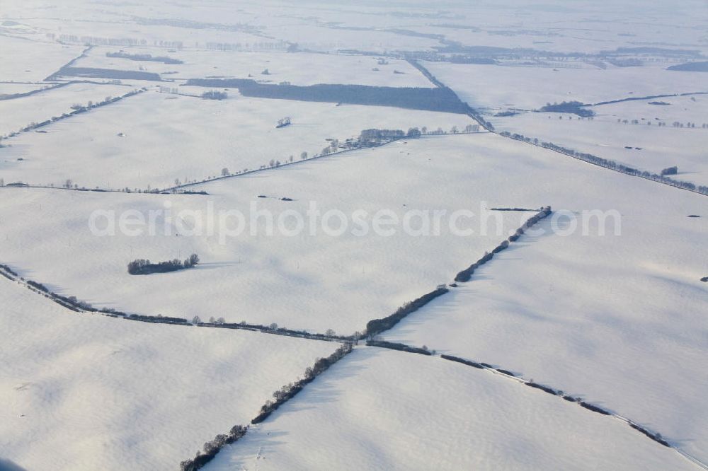 Tutow from above - Winterlandschaft in Mecklenburg-Vorpommern in der Abendsonne.