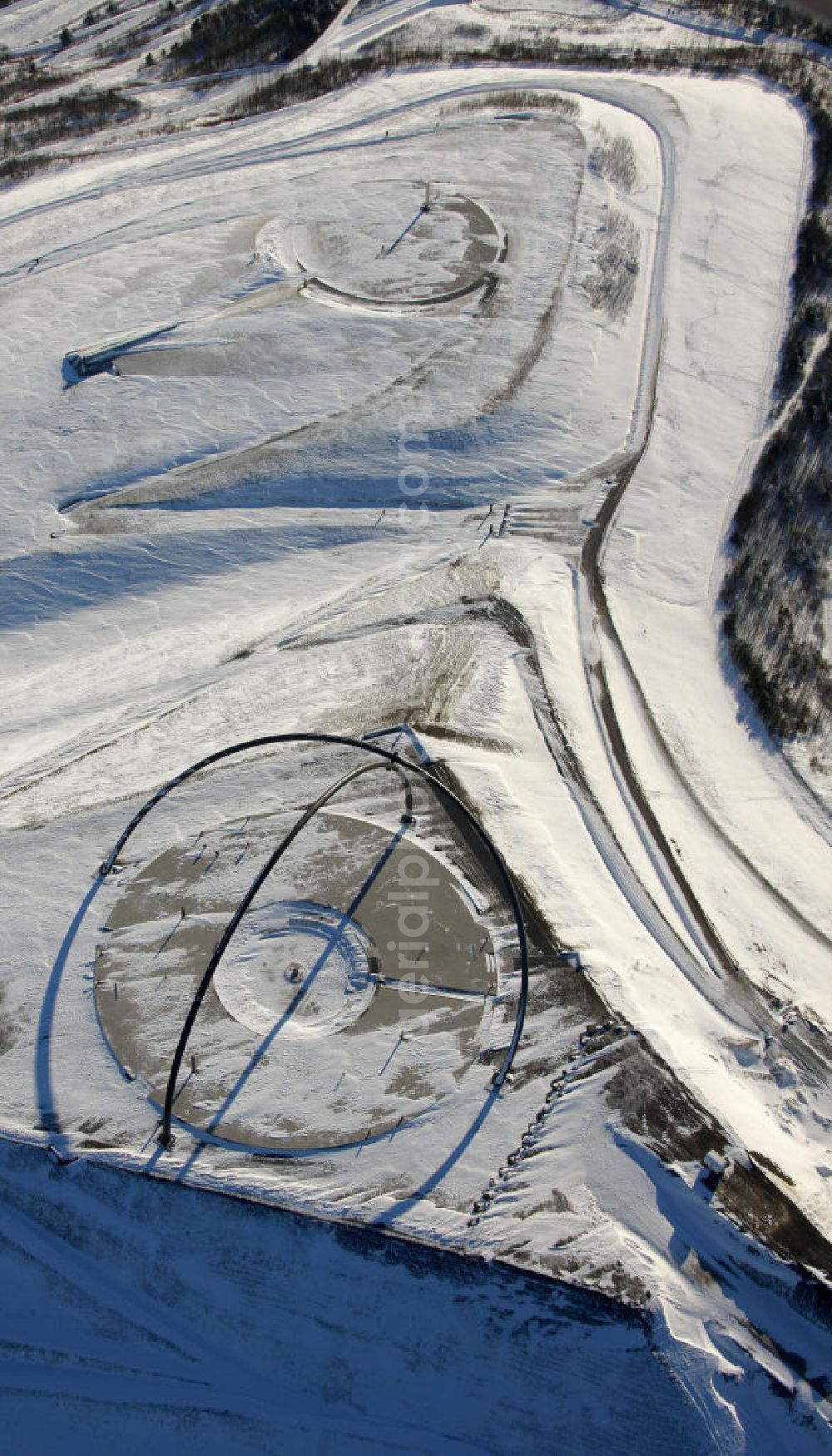 Herten from above - Winterlandschaft vom Landschaftspark der Emscherbruch Halde bei Herten. Snowy winter landscape park Emscherbruch heap near Herten.