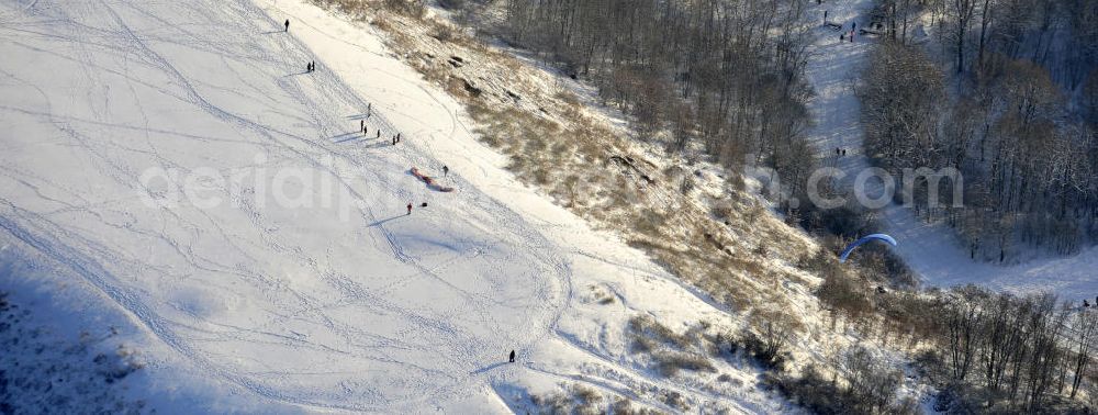 Berlin from the bird's eye view: Winterlandschaft am Rodelberg am Teufelsberg in Berlin. Winter landscape on the sledding hill at Devil's Mountain in Berlin.