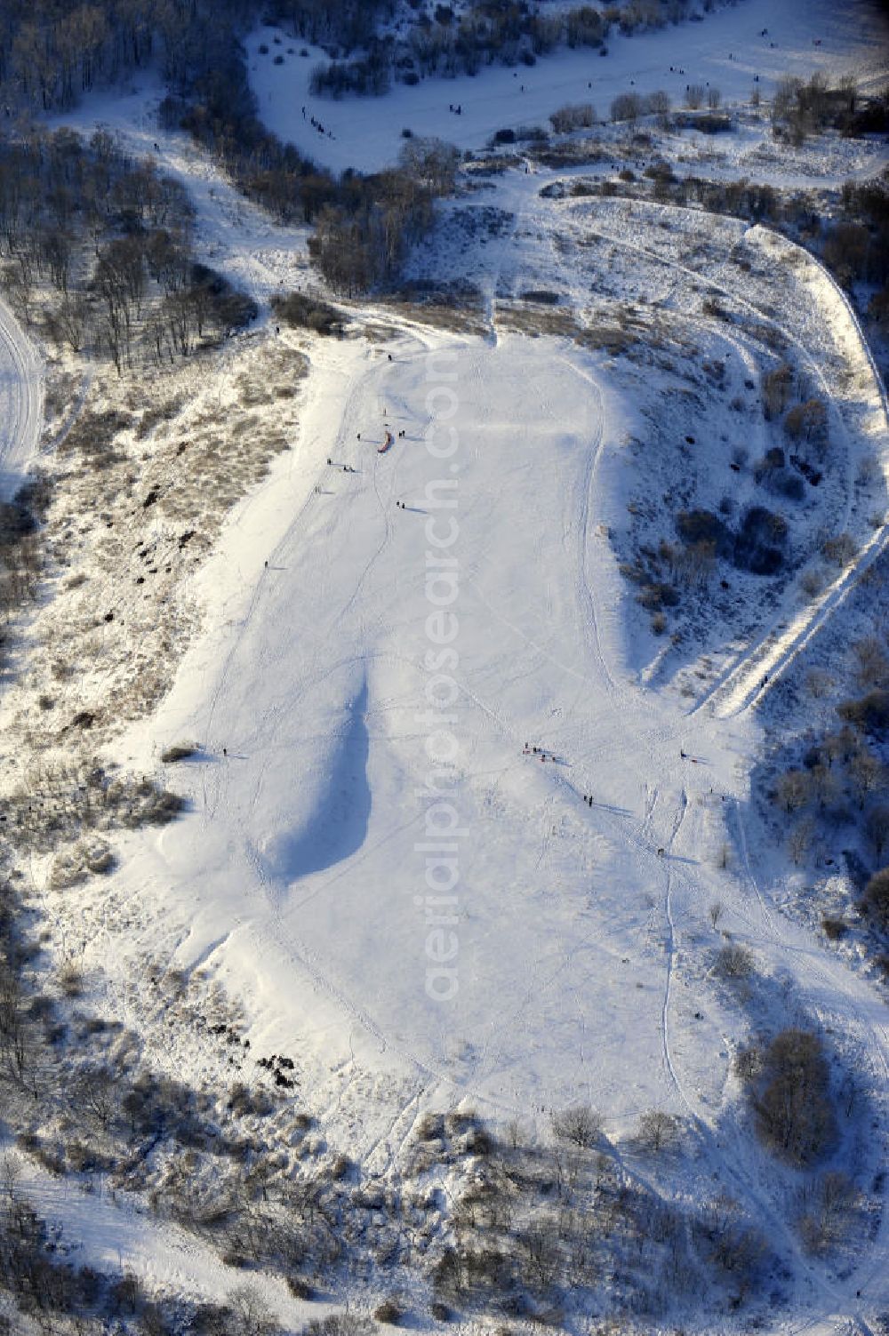 Berlin from above - Winterlandschaft am Rodelberg am Teufelsberg in Berlin. Winter landscape on the sledding hill at Devil's Mountain in Berlin.