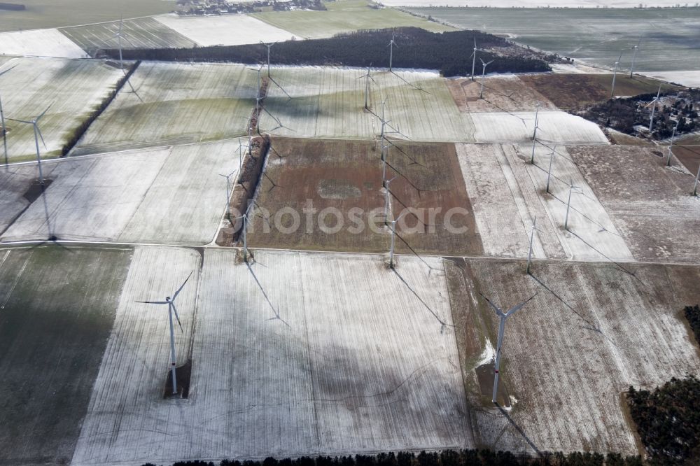 Aerial image Niedergörsdorf - Winter landscape with wind turbines in Niedergoersdorf in Brandenburg