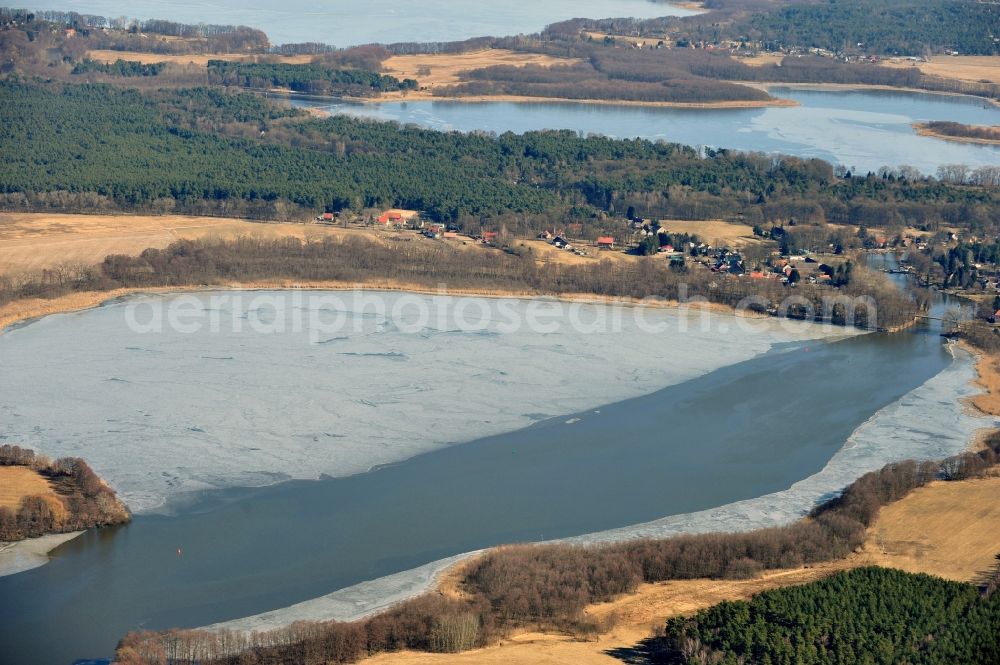 Aerial image Heidesee OT Gussow - View of the winter covered in snow and frozen Dolgensee near Gussow in the state of Brandenburg