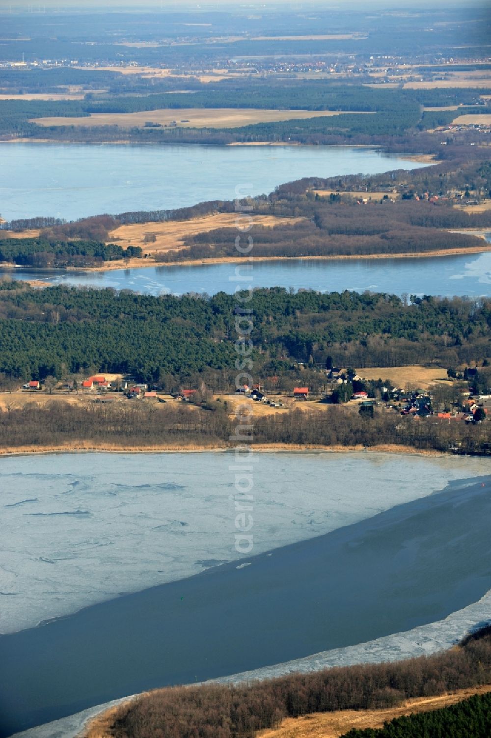 Aerial photograph Heidesee OT Gussow - View of the winter covered in snow and frozen Dolgensee near Gussow in the state of Brandenburg