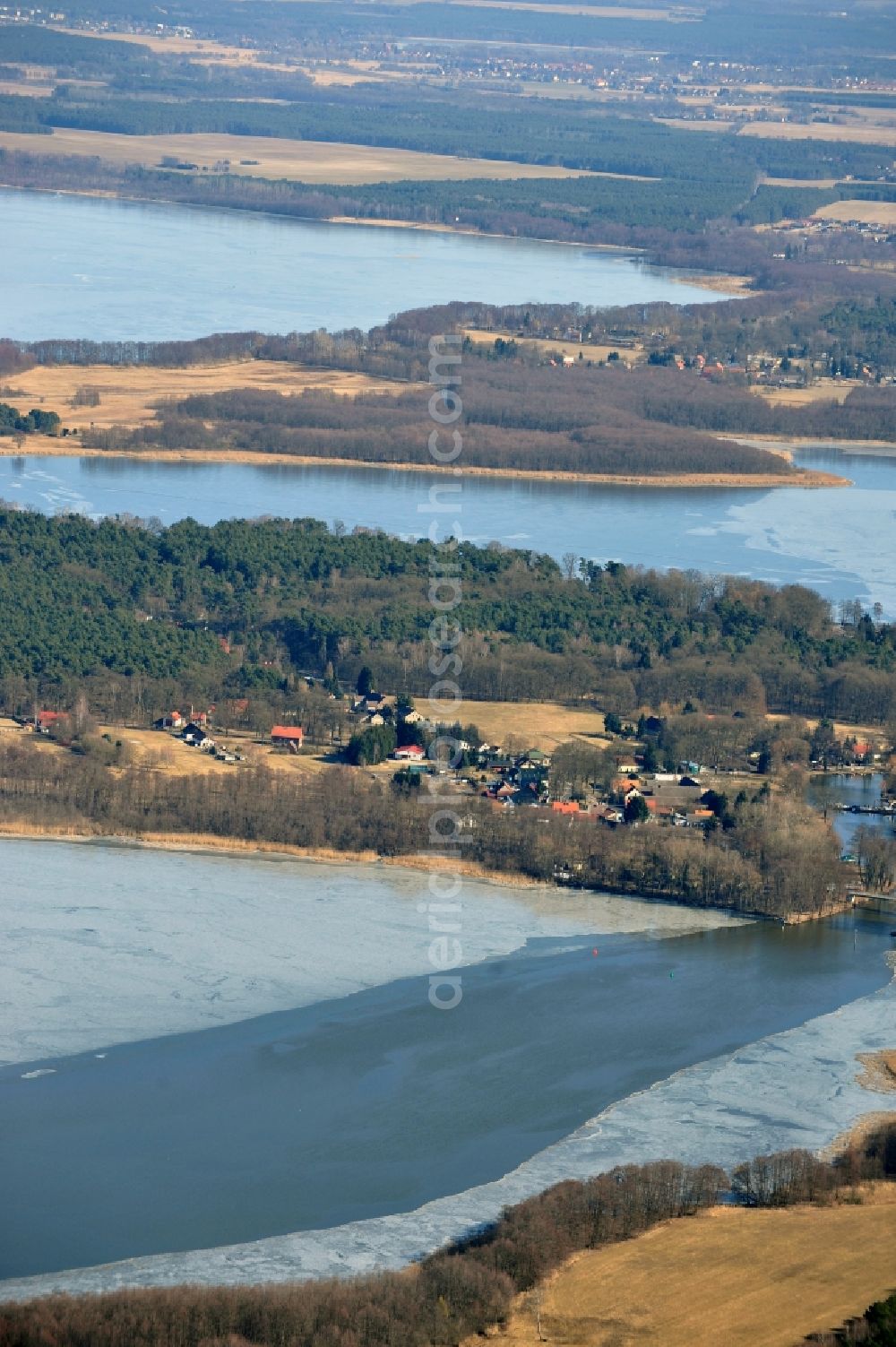 Heidesee OT Gussow from above - View of the winter covered in snow and frozen Dolgensee near Gussow in the state of Brandenburg