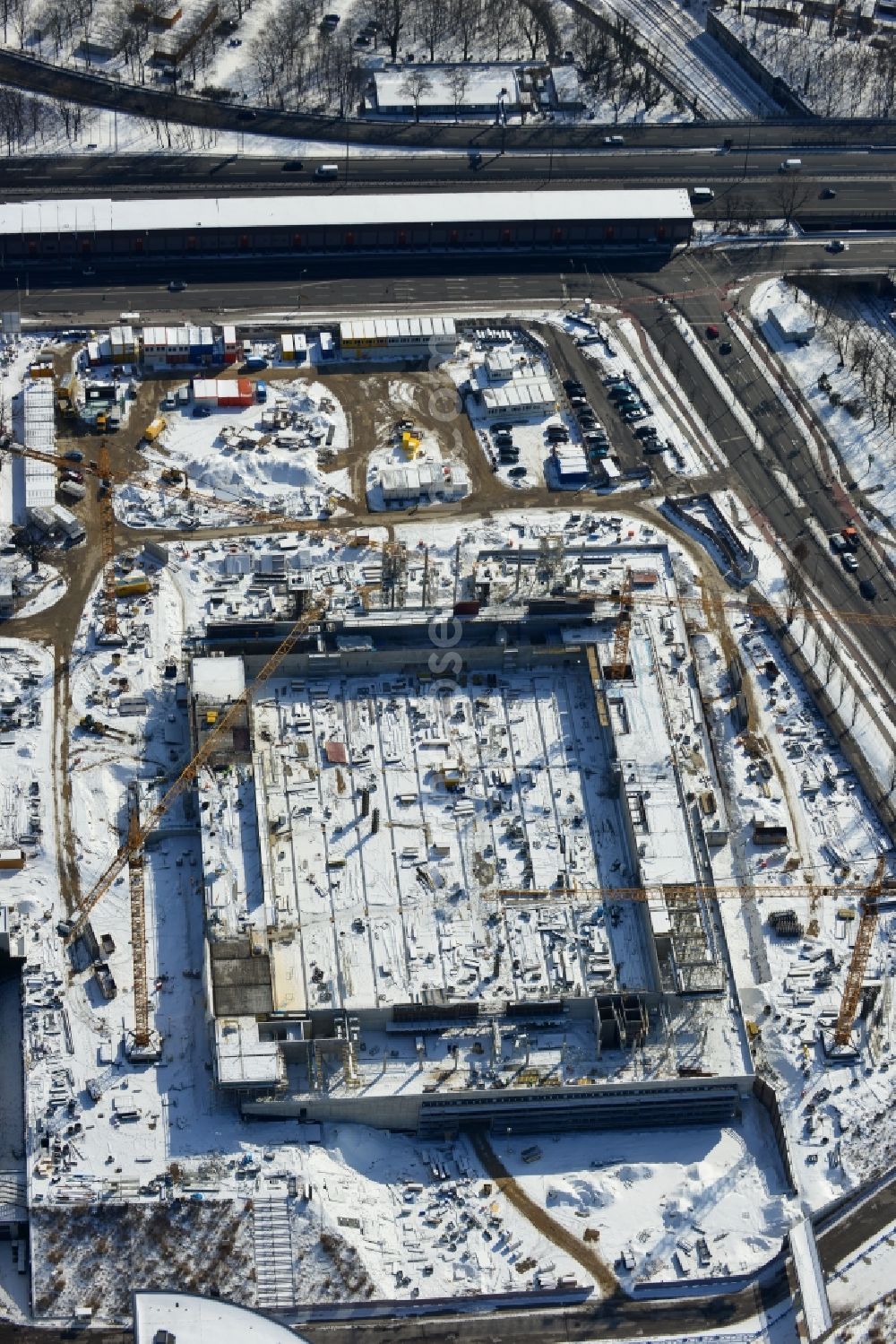 Berlin from above - View of construction site at the exhibition venue Cube City Exhibition Grounds in Berlin Charlottenburg. On the site of the demolished Germany Hall is to be completed by the end of 2013, designed by the architectural firm UNIQUE CODE suitable congress hall