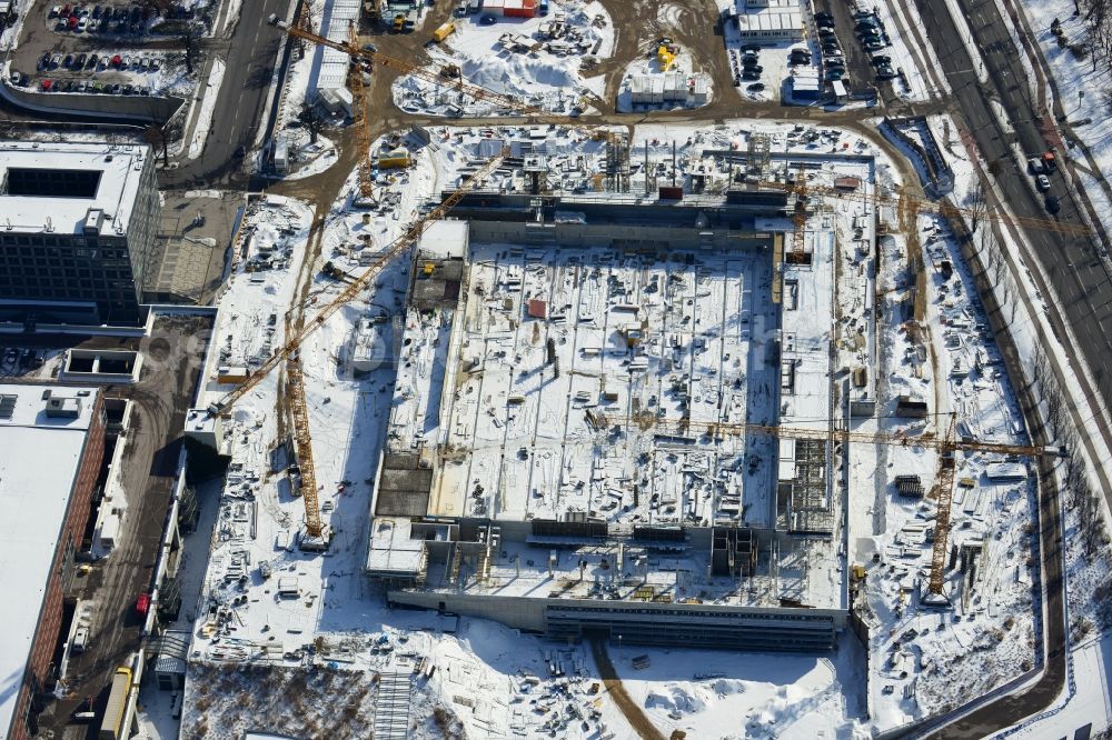 Berlin from the bird's eye view: View of construction site at the exhibition venue Cube City Exhibition Grounds in Berlin Charlottenburg. On the site of the demolished Germany Hall is to be completed by the end of 2013, designed by the architectural firm UNIQUE CODE suitable congress hall