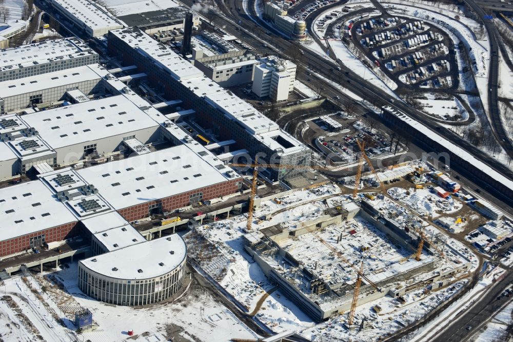 Aerial photograph Berlin - View of construction site at the exhibition venue Cube City Exhibition Grounds in Berlin Charlottenburg. On the site of the demolished Germany Hall is to be completed by the end of 2013, designed by the architectural firm UNIQUE CODE suitable congress hall