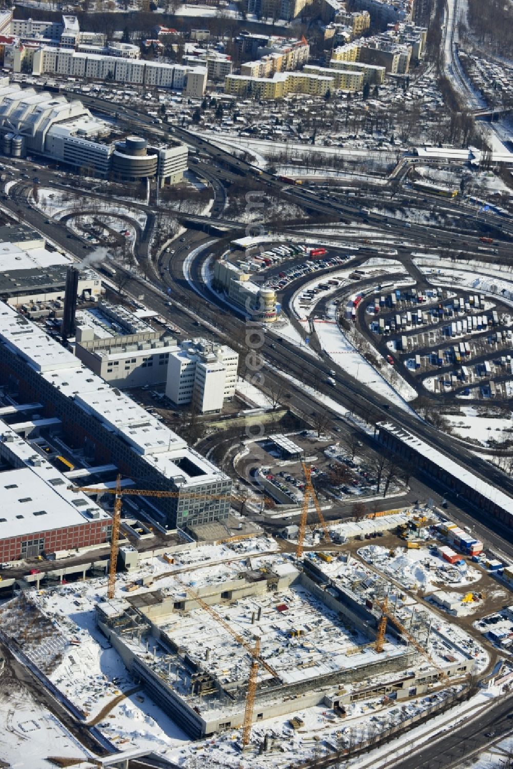 Berlin from above - View of construction site at the exhibition venue Cube City Exhibition Grounds in Berlin Charlottenburg. On the site of the demolished Germany Hall is to be completed by the end of 2013, designed by the architectural firm UNIQUE CODE suitable congress hall