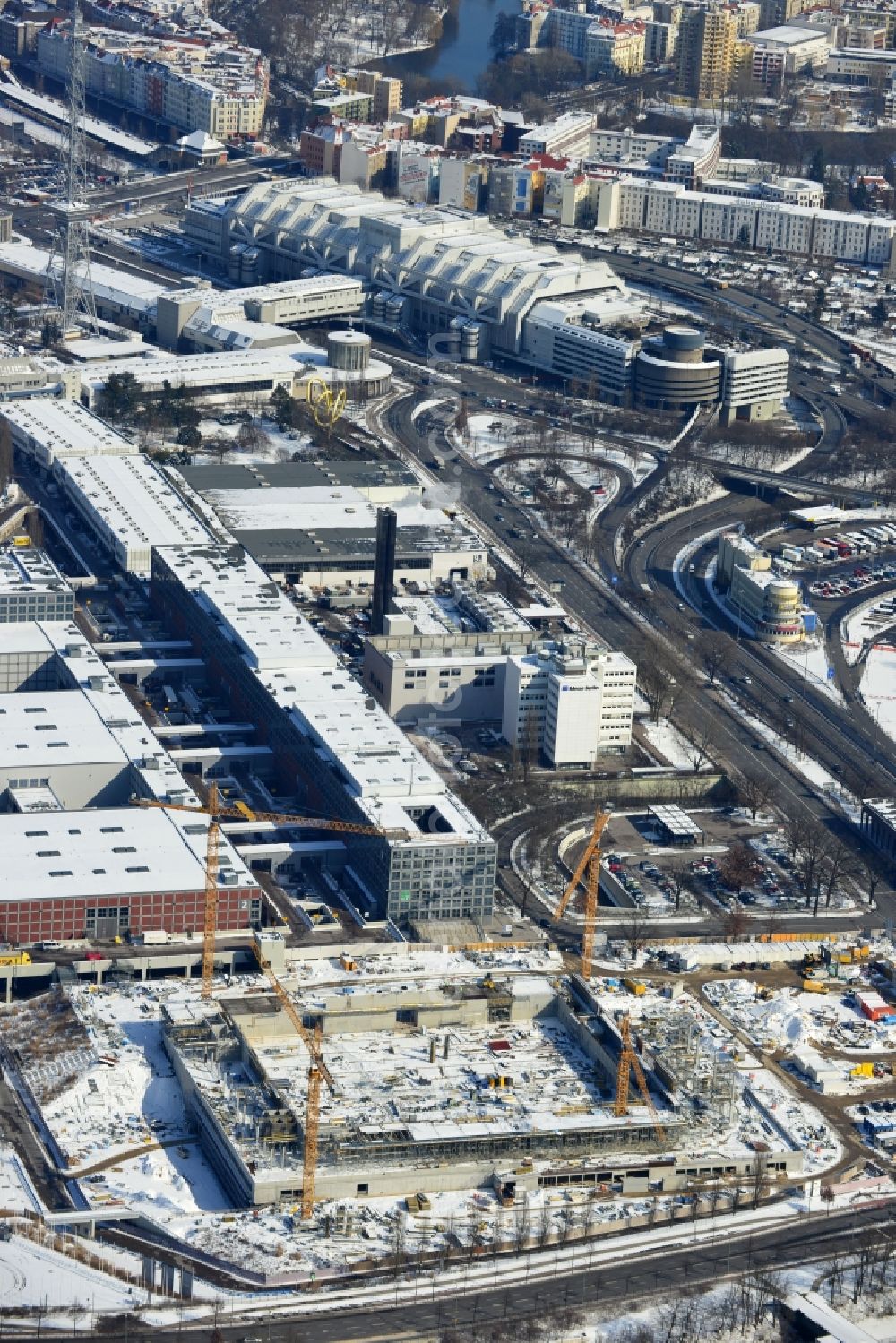 Berlin from the bird's eye view: View of construction site at the exhibition venue Cube City Exhibition Grounds in Berlin Charlottenburg. On the site of the demolished Germany Hall is to be completed by the end of 2013, designed by the architectural firm UNIQUE CODE suitable congress hall