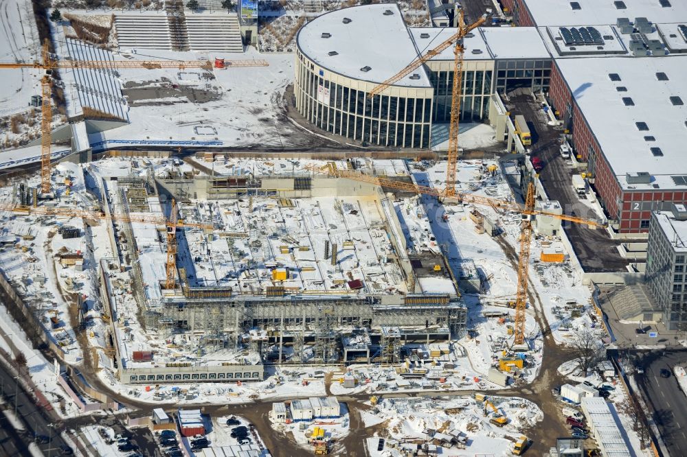 Berlin from above - View of construction site at the exhibition venue Cube City Exhibition Grounds in Berlin Charlottenburg. On the site of the demolished Germany Hall is to be completed by the end of 2013, designed by the architectural firm UNIQUE CODE suitable congress hall