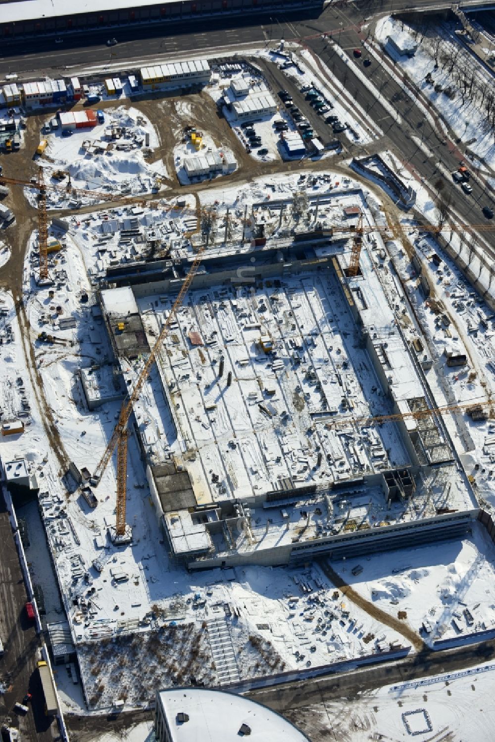 Aerial photograph Berlin - View of construction site at the exhibition venue Cube City Exhibition Grounds in Berlin Charlottenburg. On the site of the demolished Germany Hall is to be completed by the end of 2013, designed by the architectural firm UNIQUE CODE suitable congress hall