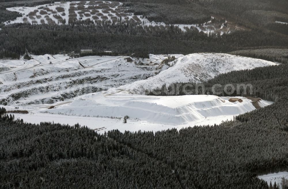 Schulenberg im Oberharz from above - Winter snow-covered heap of quarry Huneberg at Schulenberg in the Upper Harz Mountains in Lower Saxony