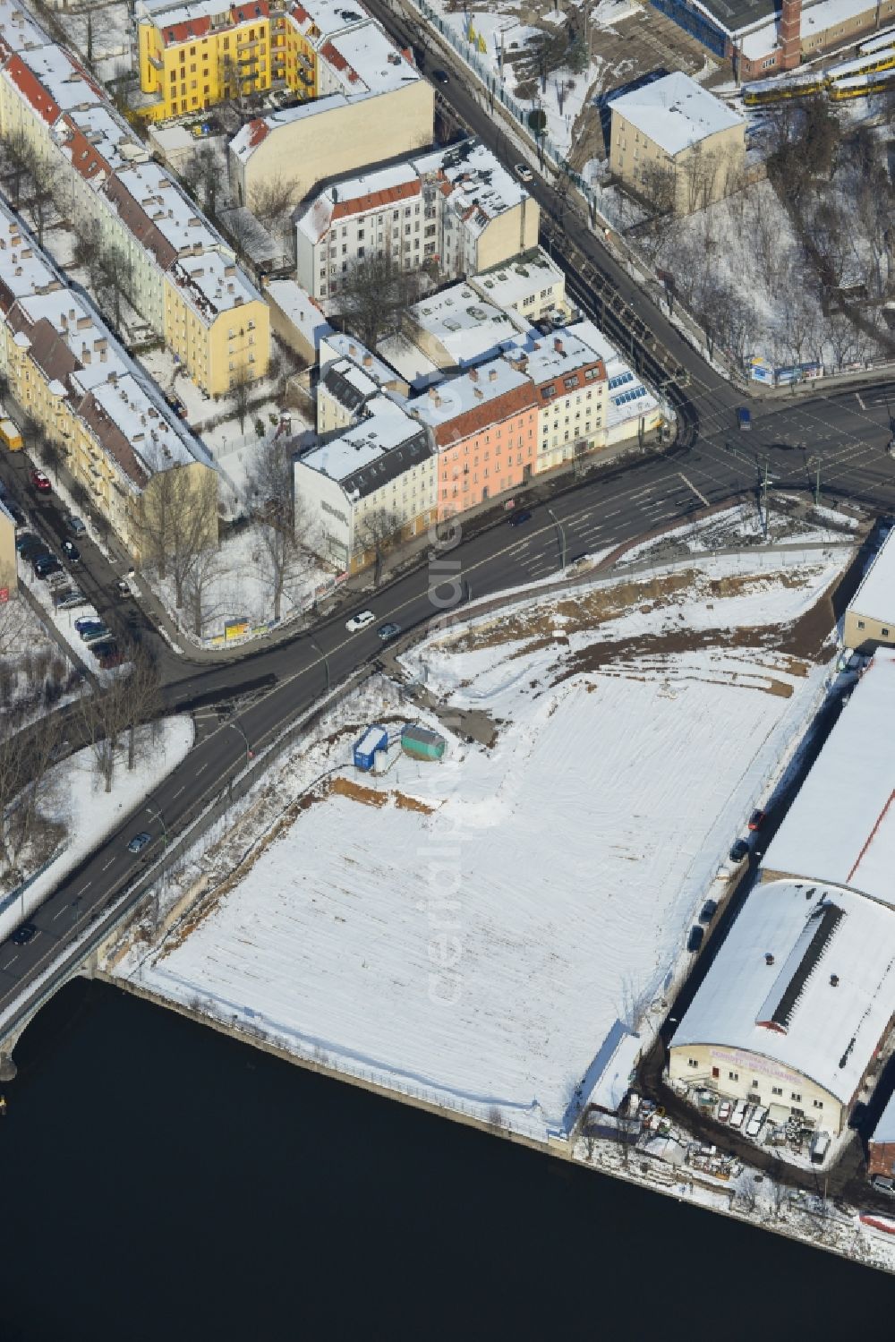 Berlin Schöneweide from the bird's eye view: Winter covered with snow industrial area in Berlin Schöneweide