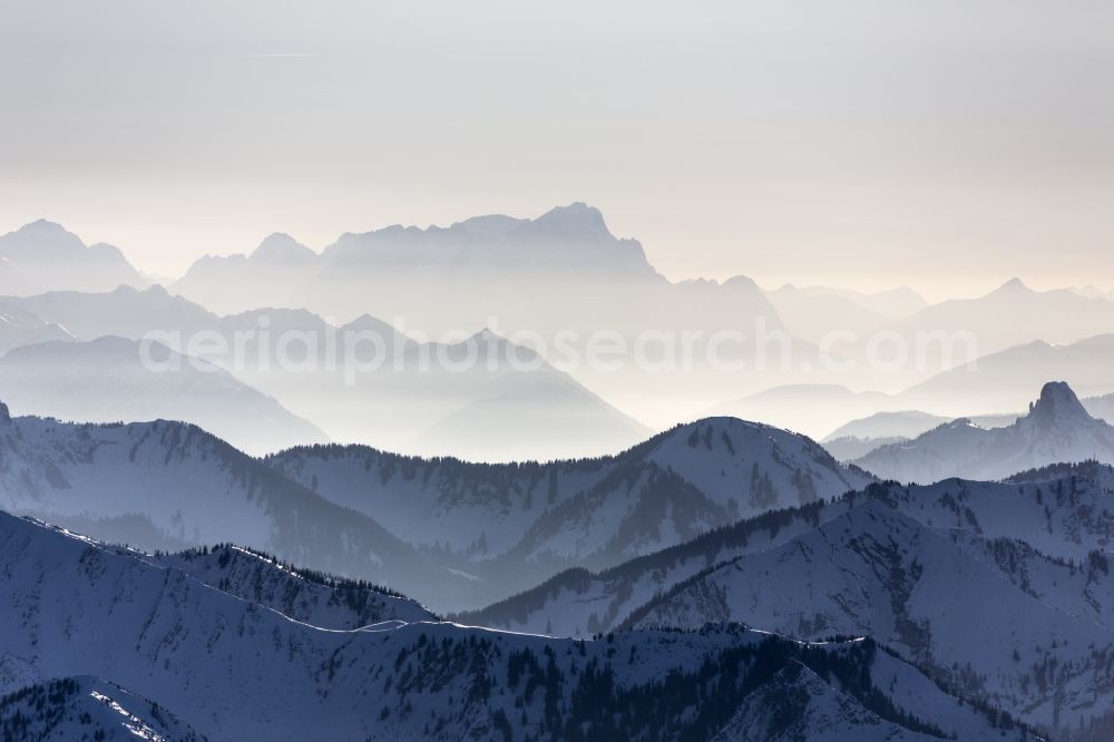 Garmisch-Partenkirchen from the bird's eye view: Wintry landscape with snow covered by Mangfallgebirge with the Zugspitze in the background near Garmisch-Partenkirchen in Bavaria