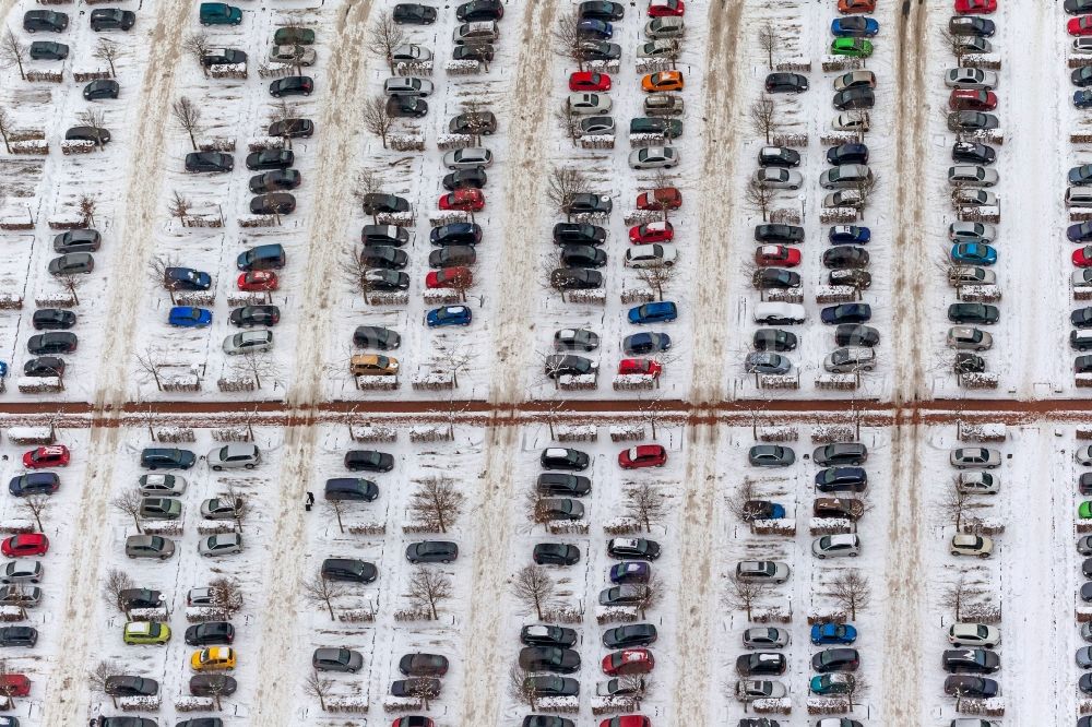 Hamm from above - Winter snow-covered rows of parked cars in the lot before the OLG Hamm in North Rhine-Westphalia