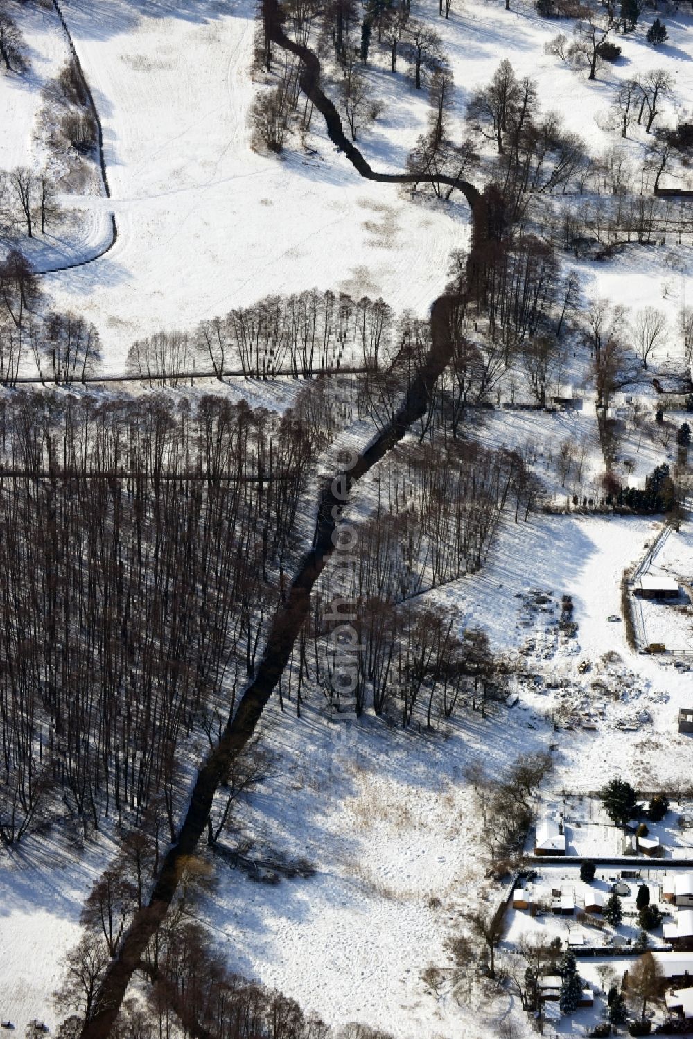 Aerial photograph Dahlwitz - Hoppegarten - Winter snow-covered winter landscape in Dahlwitz - Hoppegarten in Brandenburg