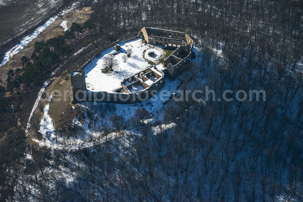 Mühlberg from the bird's eye view: Winter covered with snow hill the castle ruins Drei Gleichen of Mühlberg in Thuringia