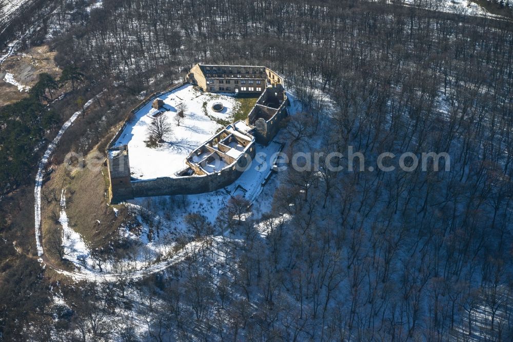 Aerial image Mühlberg - Winter covered with snow hill the castle ruins Drei Gleichen of Mühlberg in Thuringia