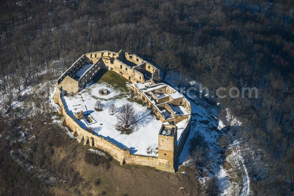 Mühlberg from above - Winter covered with snow hill the castle ruins Drei Gleichen of Mühlberg in Thuringia