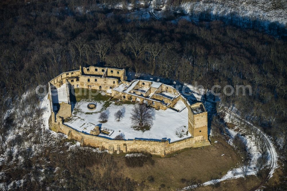 Mühlberg from the bird's eye view: Winter covered with snow hill the castle ruins Drei Gleichen of Mühlberg in Thuringia