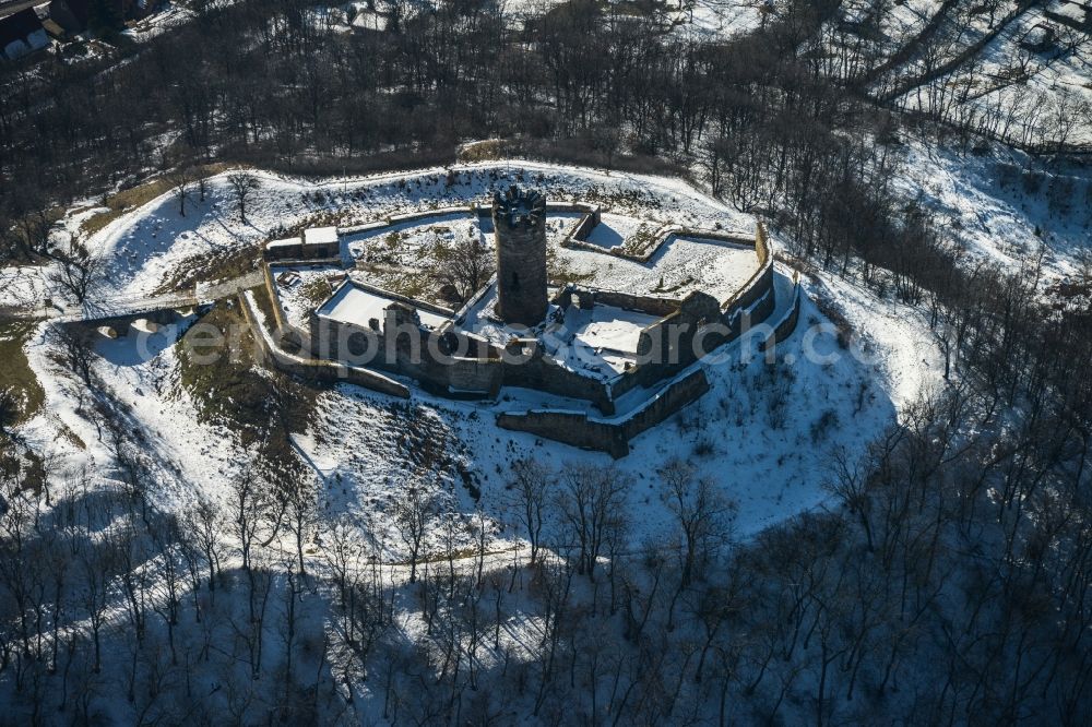 Mühlberg from above - Winter covered with snow hill the castle ruins Drei Gleichen of Mühlberg in Thuringia