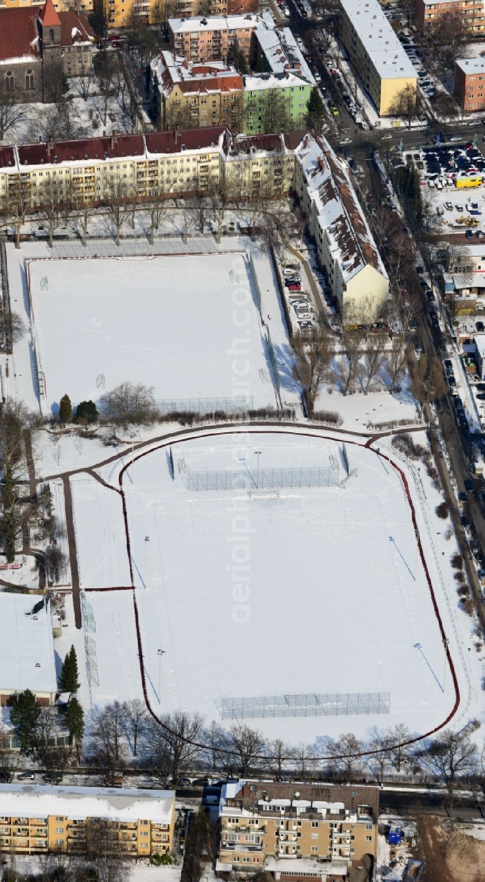 Berlin Steglitz from above - Winter covered with snow sports field / sports complex south road - mountain road in Berlin - Steglitz