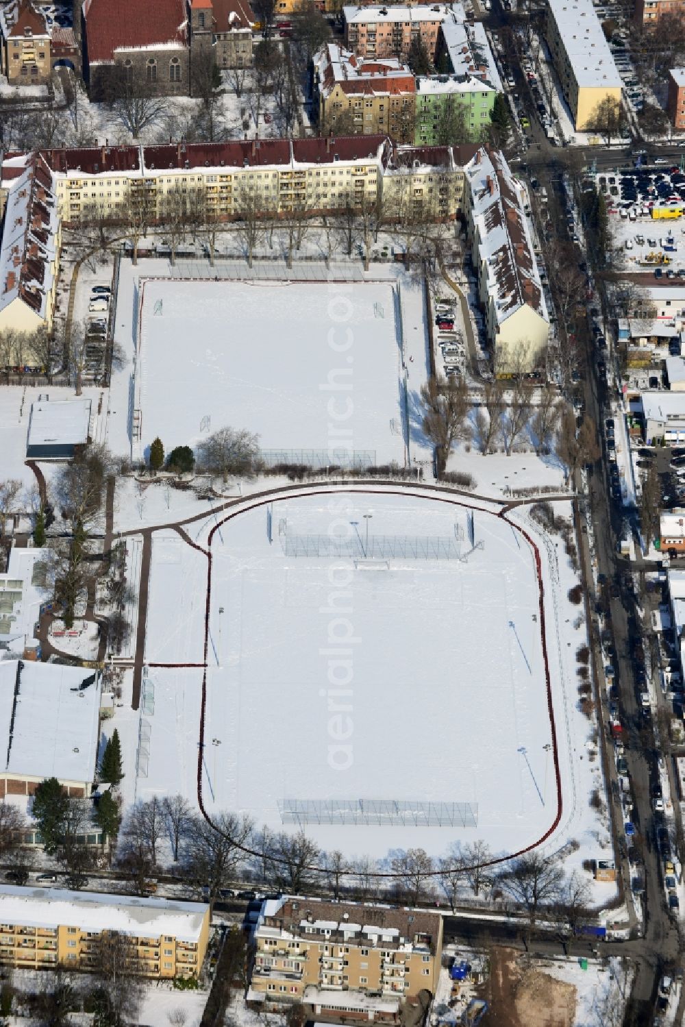 Berlin Steglitz from the bird's eye view: Winter covered with snow sports field / sports complex south road - mountain road in Berlin - Steglitz