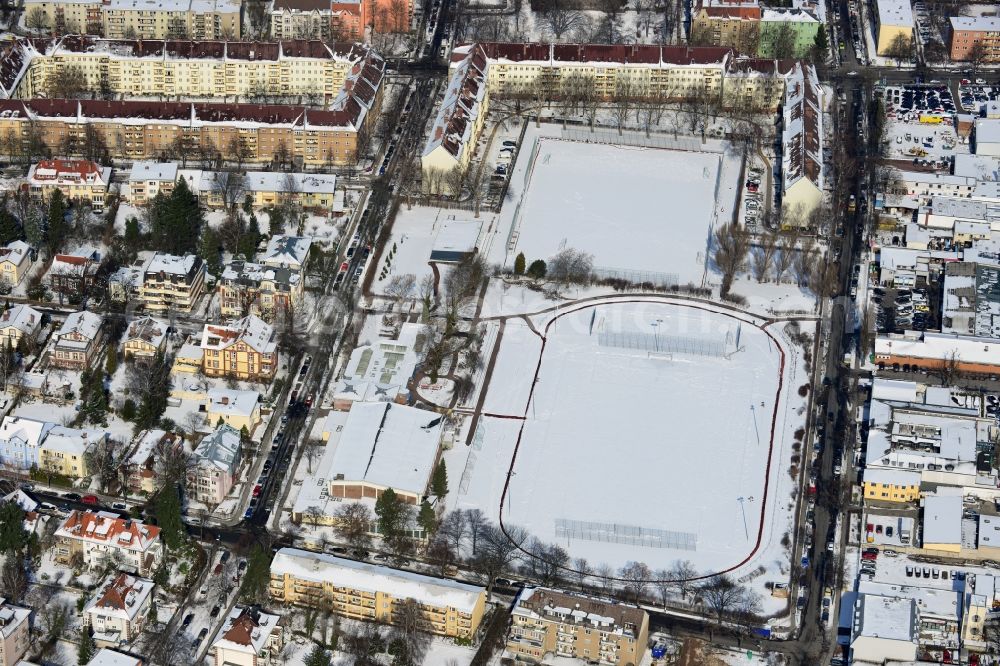 Aerial image Berlin Steglitz - Winter covered with snow sports field / sports complex south road - mountain road in Berlin - Steglitz