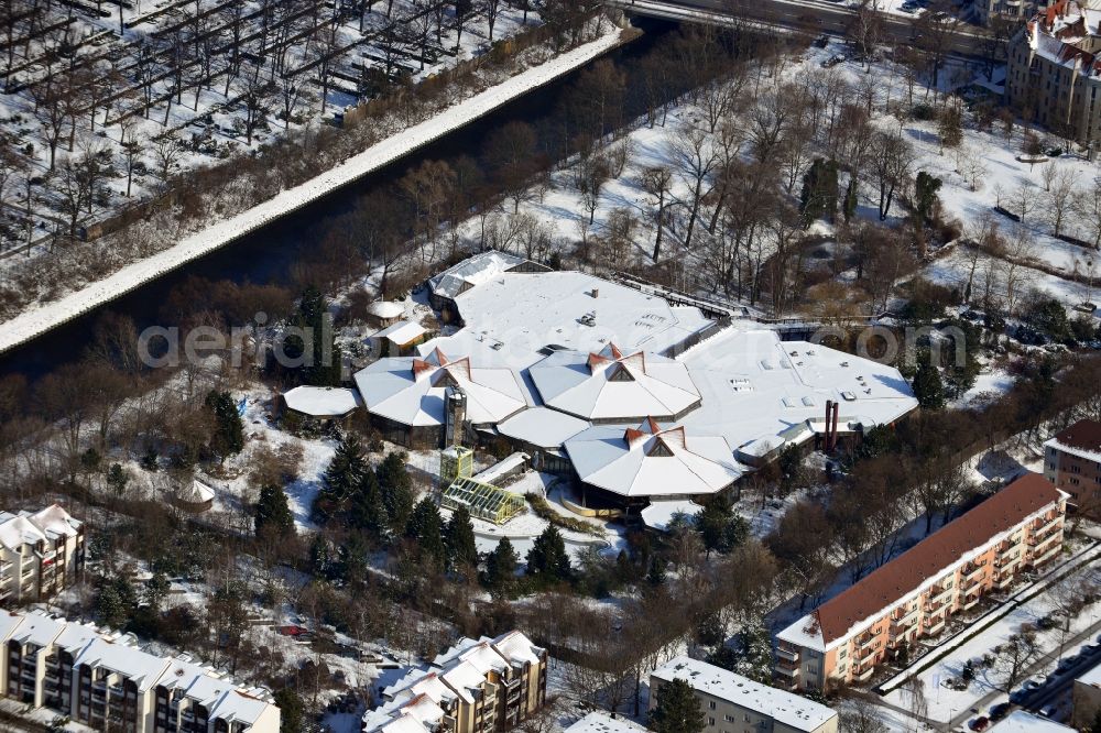 Berlin Tempelhof from the bird's eye view: Winter covered with snow building of the closed water park / water park in the district Blub Berlin Tempelhof