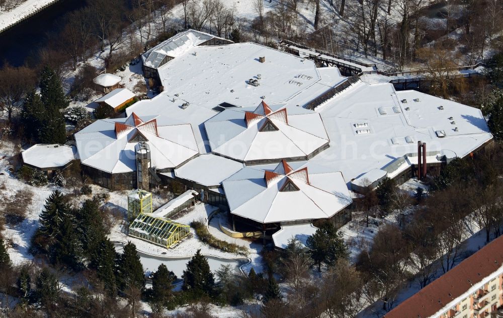 Aerial image Berlin Tempelhof - Winter covered with snow building of the closed water park / water park in the district Blub Berlin Tempelhof