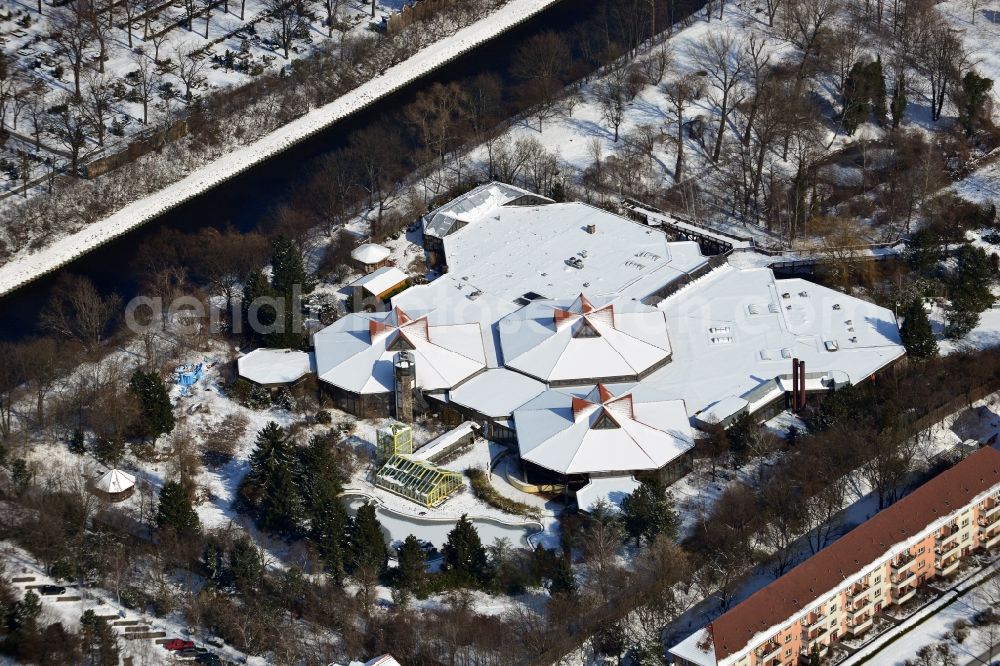 Aerial photograph Berlin Tempelhof - Winter covered with snow building of the closed water park / water park in the district Blub Berlin Tempelhof