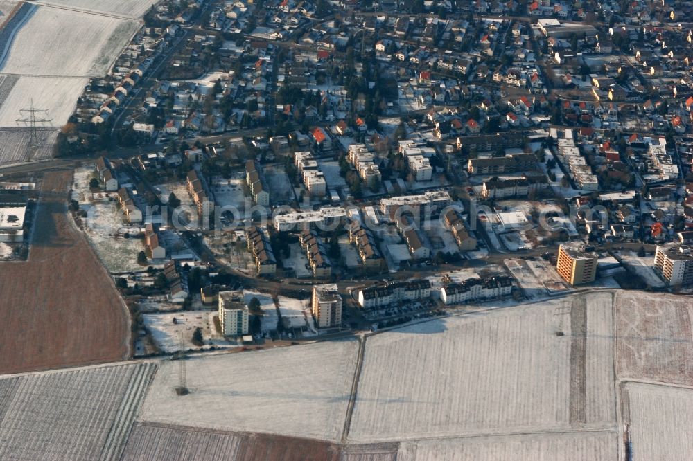 Aerial image Bad Kreuznach Winzenheim - Mixed residential area with apartment buildings and prefabricated in winter. The area is located along the road in Waldalgesheimer Strasse in Winzenheim district of Bad Kreuznach in Rhineland-Palatinate