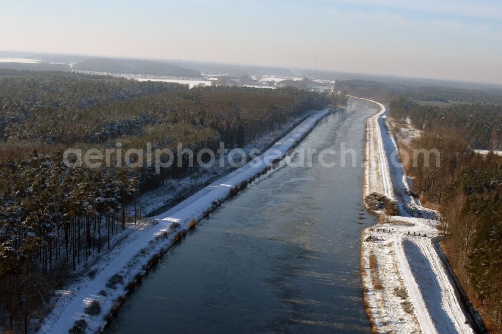 Wusterwitz from the bird's eye view: Wintry covered with snow and ice flux flow of the Elbe-Havel Canal near Wusterwitz in the state of Saxony-Anhalt