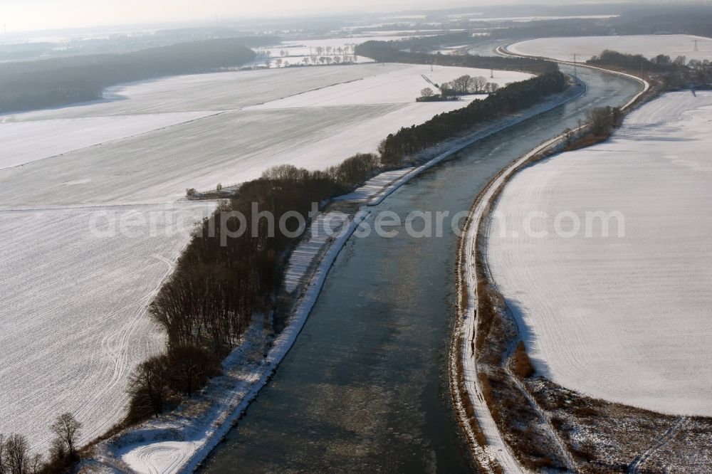 Aerial image Genthin - Wintry covered with snow and ice flux flow of the Elbe-Havel Canal in Genthin in the state of Saxony-Anhalt