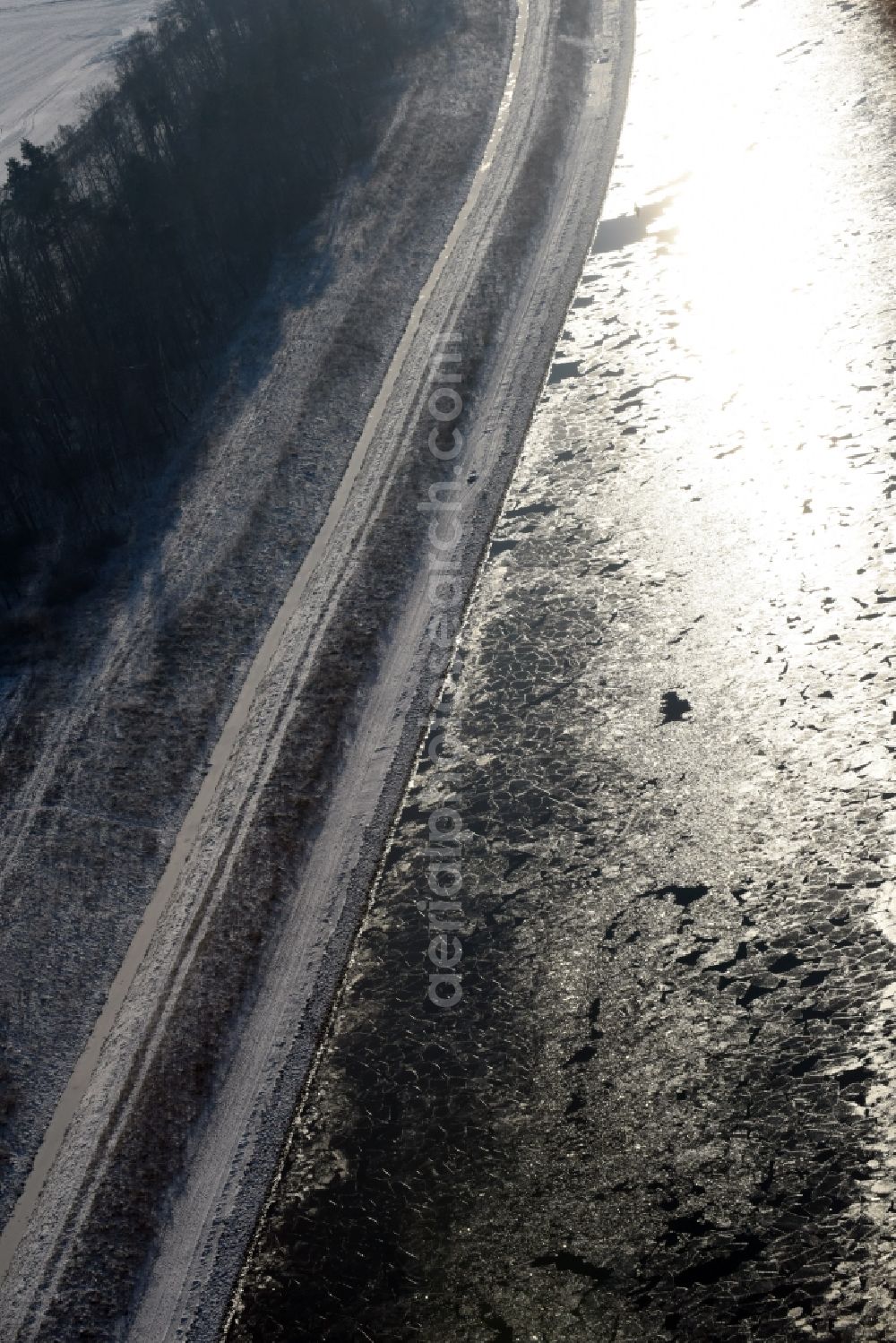 Parey from above - Wintry covered with snow and ice flux flow of the Elbe-Havel Canal in Parey in the state of Saxony-Anhalt