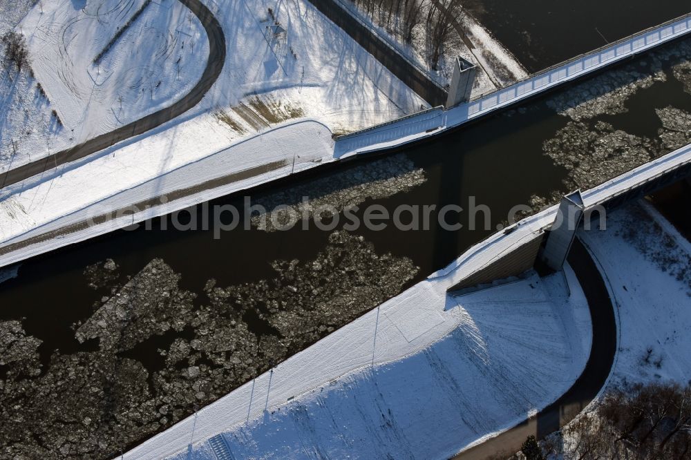 Hohenwarthe from above - Wintry snow and sea ice covered trough bridge from the Mittellandkanal over the Elbe to the Elbe-Havel Canal waterfront crossroads MD in Hohenwarthe, Saxony-Anhalt