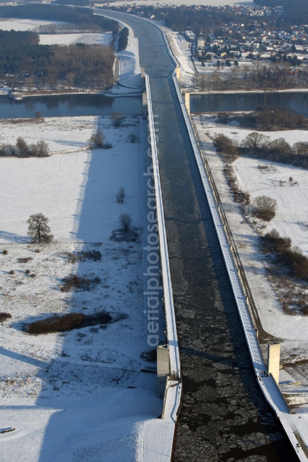 Hohenwarthe from above - Wintry snow and sea ice covered trough bridge from the Mittellandkanal over the Elbe to the Elbe-Havel Canal waterfront crossroads MD in Hohenwarthe, Saxony-Anhalt