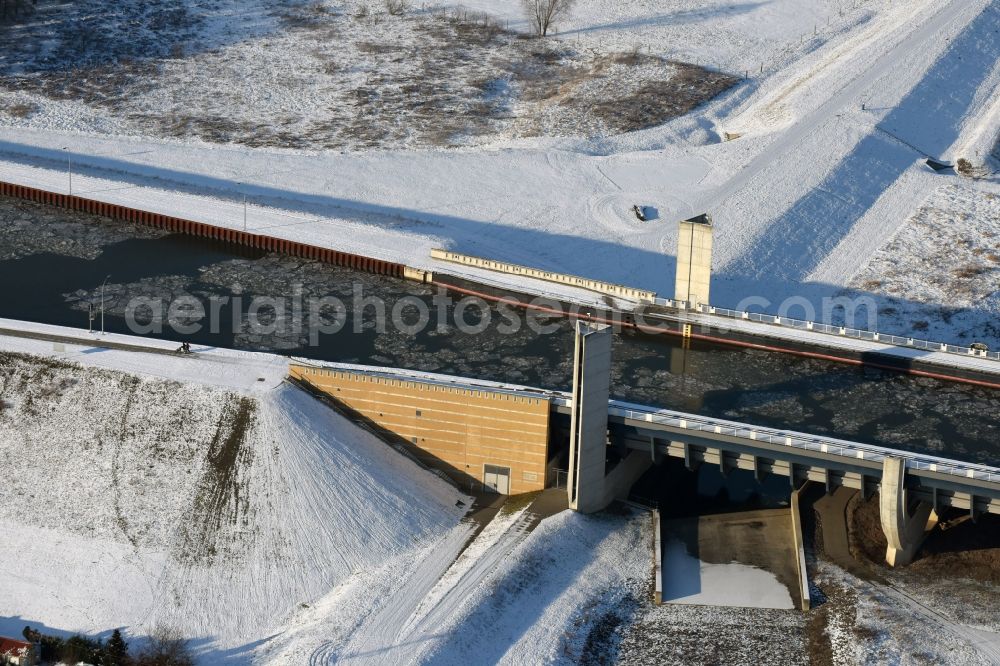 Hohenwarthe from above - Wintry snow and sea ice covered trough bridge from the Mittellandkanal over the Elbe to the Elbe-Havel Canal waterfront crossroads MD in Hohenwarthe, Saxony-Anhalt