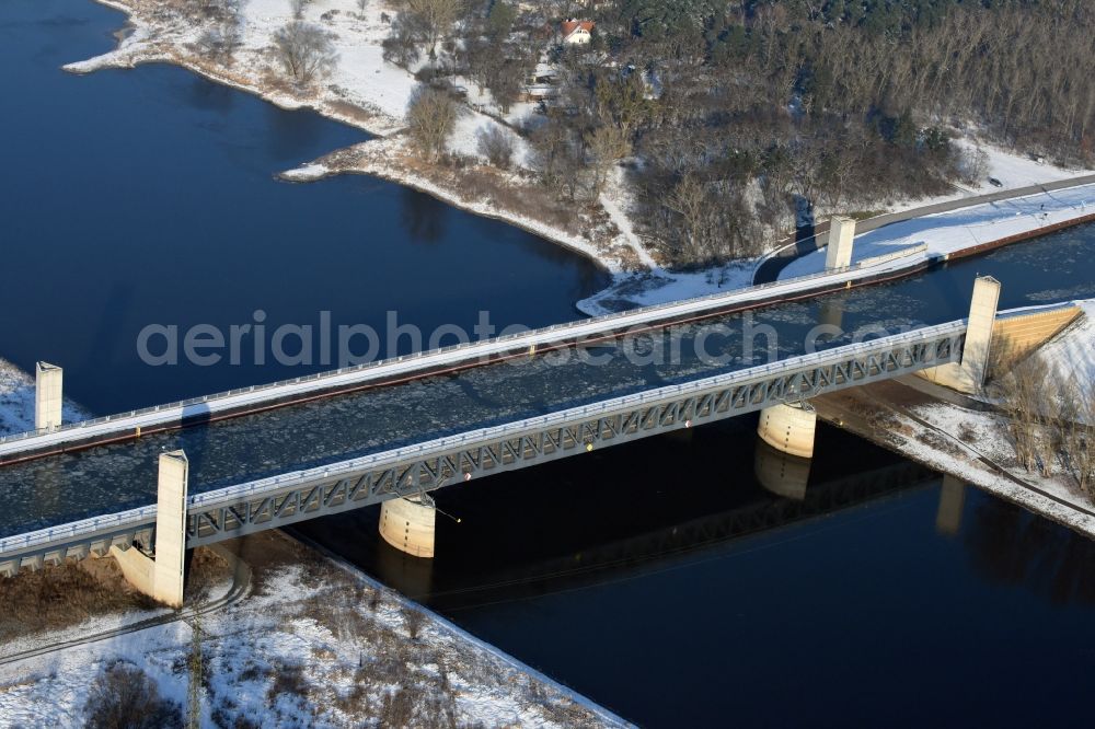 Hohenwarthe from above - Wintry snow and sea ice covered trough bridge from the Mittellandkanal over the Elbe to the Elbe-Havel Canal waterfront crossroads MD in Hohenwarthe, Saxony-Anhalt