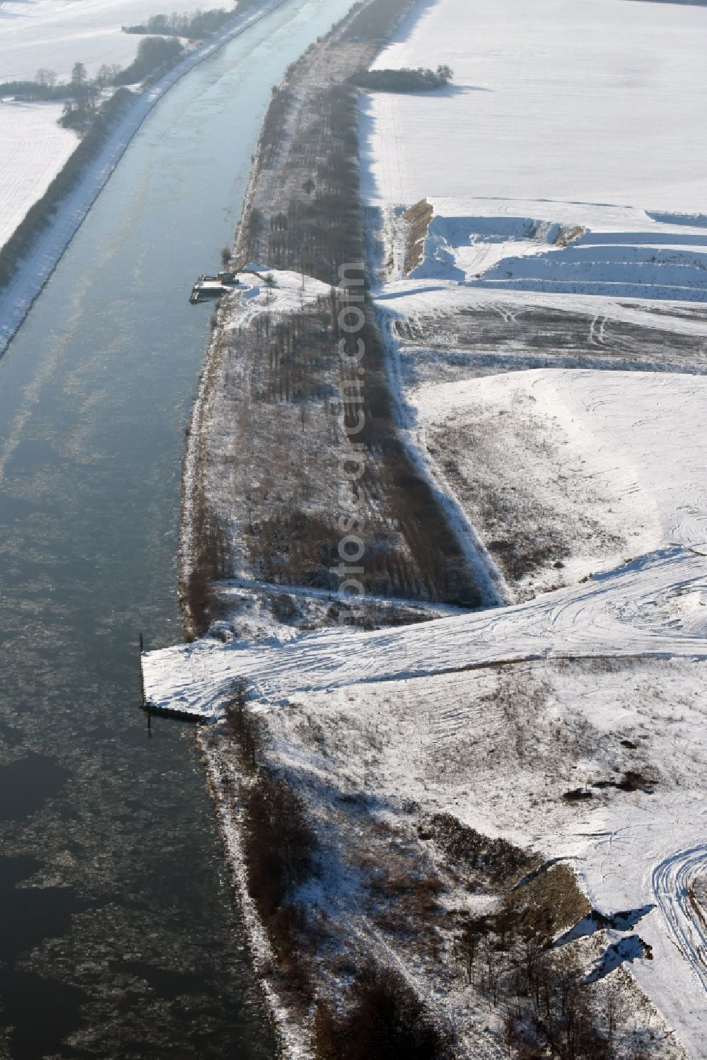 Aerial image Elbe-Parey - Wintry snowy eposition surfaces in Bergzow on the Elbe-Havel Canal in the state of Saxony-Anhalt