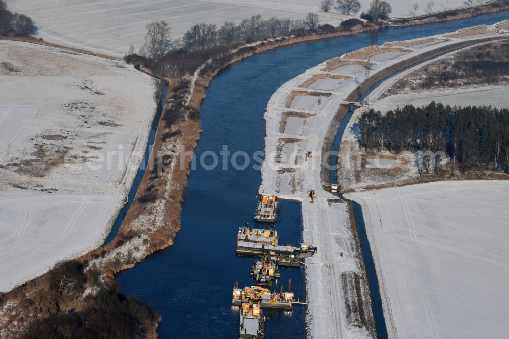 Aerial photograph Ihleburg - Wintry snowy disposal sites on the banks of the Elbe-Havel canal at Ihleburg in Saxony-Anhalt