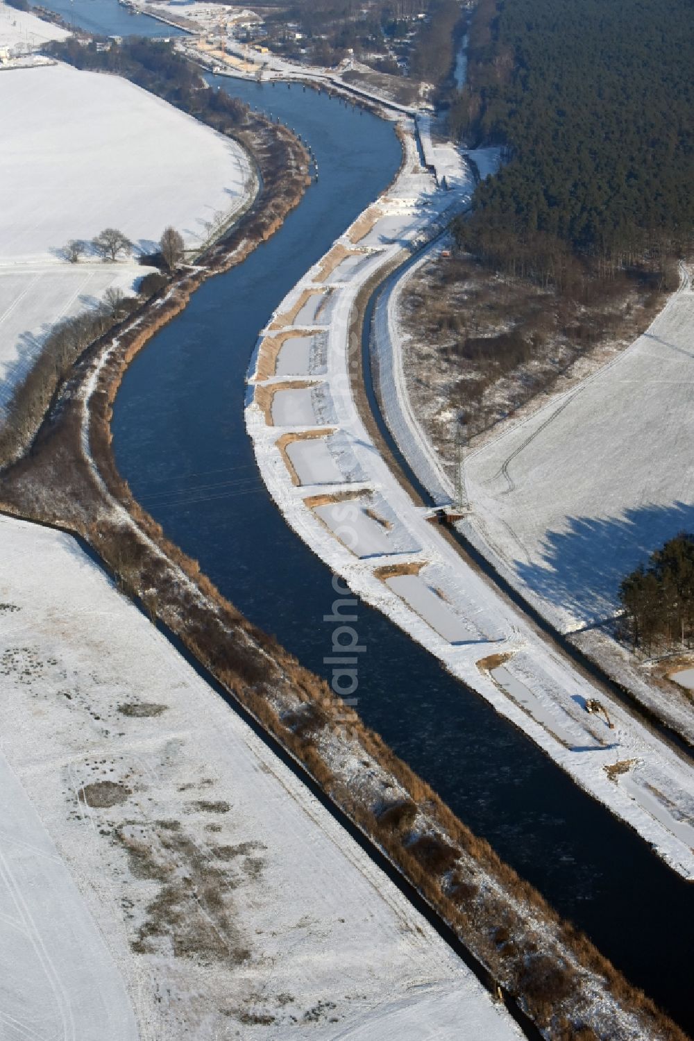 Aerial image Ihleburg - Wintry snowy disposal sites on the banks of the Elbe-Havel canal at Ihleburg in Saxony-Anhalt