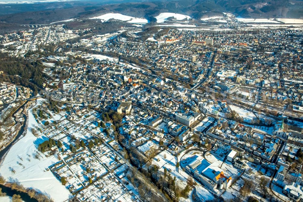 Arnsberg from the bird's eye view: Wintry snowy old town of Arnsberg in the federal state North Rhine-Westphalia