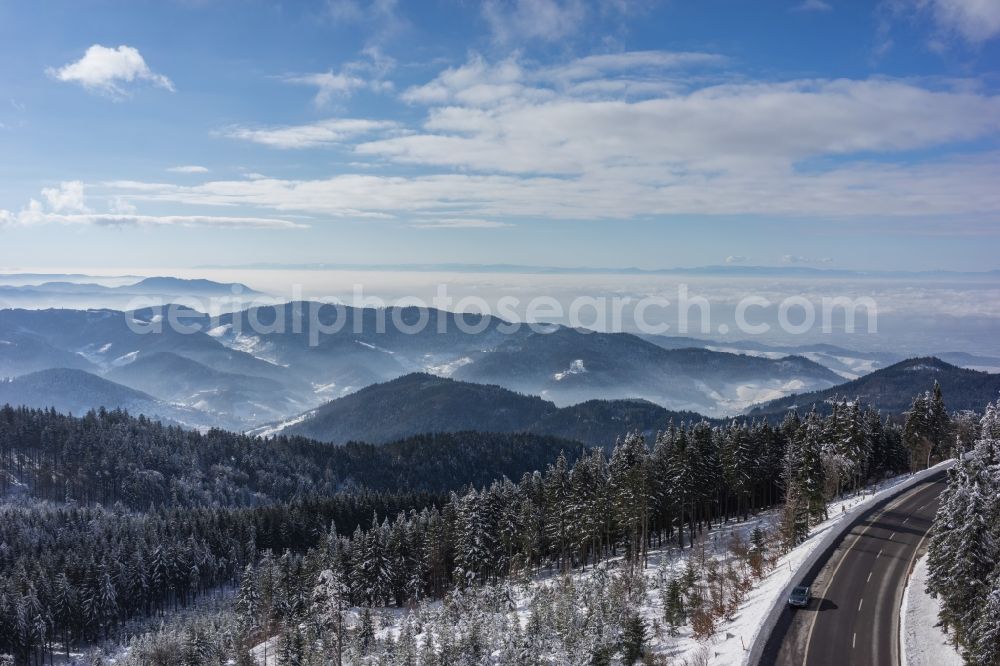 Aerial photograph Seebach - Wintry snowy treetops in a wooded area in Seebach in the state Baden-Wuerttemberg