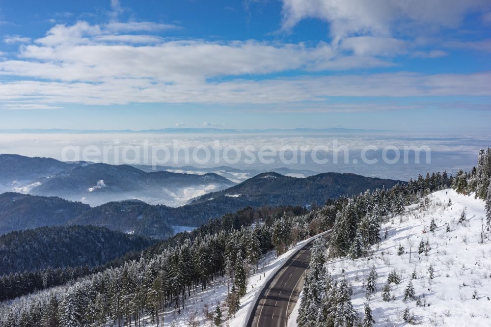 Seebach from the bird's eye view: Wintry snowy treetops in a wooded area in Seebach in the state Baden-Wuerttemberg