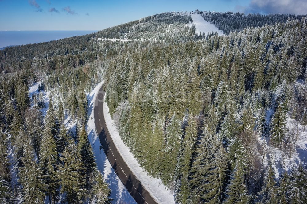 Aerial image Seebach - Wintry snowy treetops in a wooded area in Seebach in the state Baden-Wuerttemberg